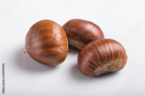  sweet chestnuts isolated on white background
