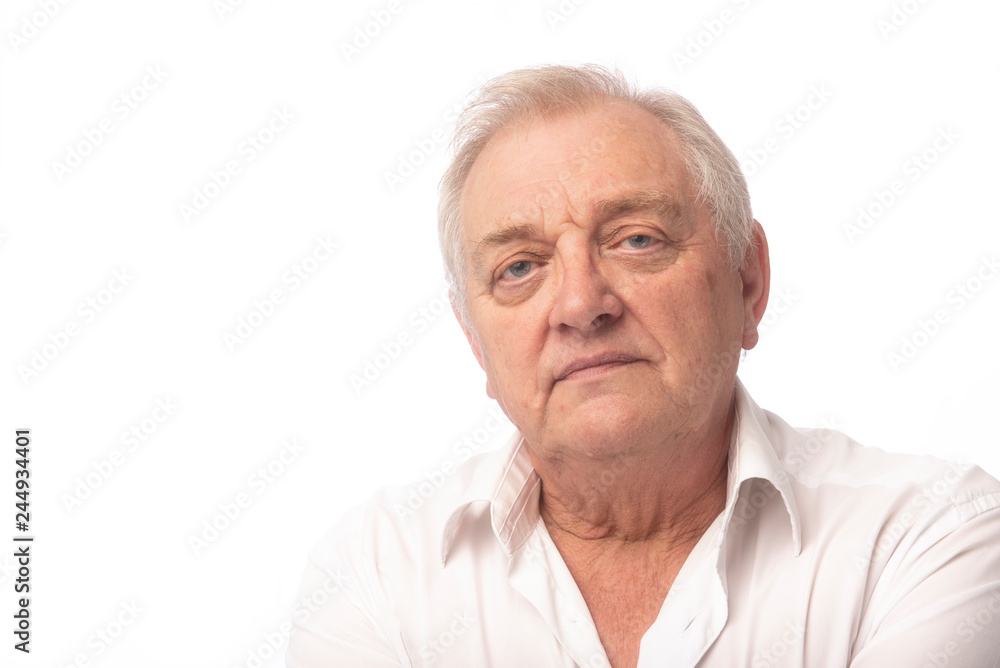 Serious mature man on white background with copy space Serious mature man on white background with copy space