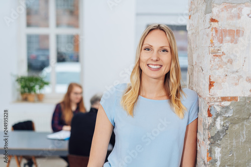 Smiling attractive casual young businesswoman Free Download Smiling attractive casual young businesswoman - GFXLoad