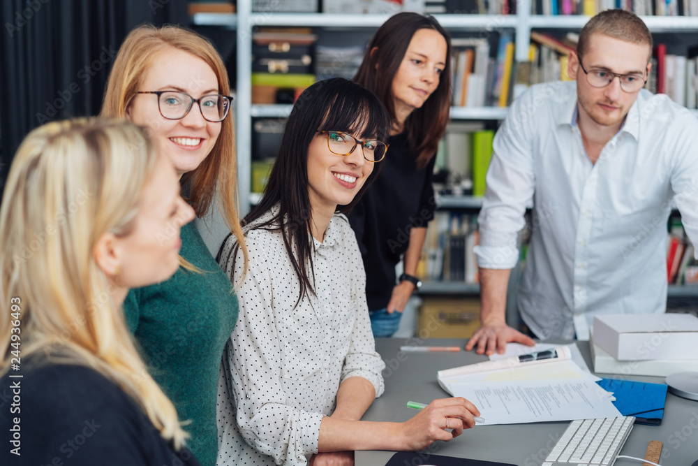 Young diverse business team in a meeting Young diverse business team in a meeting