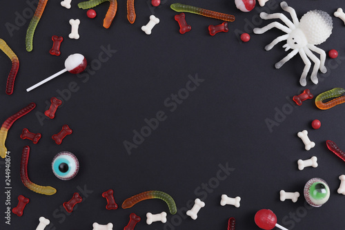 Halloween background with decorative creepy web and spiders on old wooden boards. Blank space for text. Festive concept. insects
