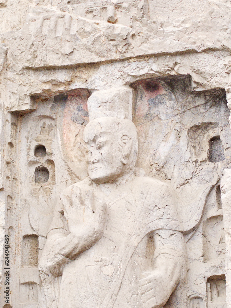 Luoyang Longmen grottoes. Buddha and the stone caves and sculptures in the Longmen Grottoes in Luoyang, China. Taken in 14th October 2018 Luoyang Longmen grottoes. Buddha and the stone caves and sculptures in the Longmen Grottoes in Luoyang, China. Taken in 14th October 2018