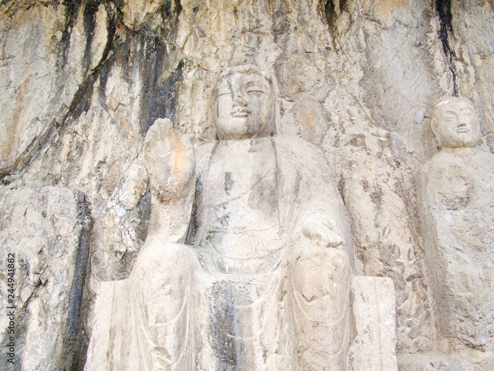 Luoyang Longmen grottoes. Buddha and the stone caves and sculptures in the Longmen Grottoes in Luoyang, China. Taken in 14th October 2018