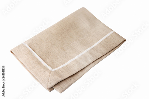 
Beige fabric napkin isolated on a white background.