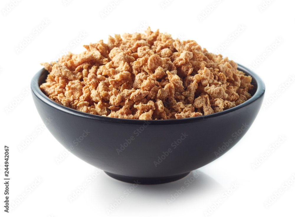 Bowl of soya chunks on white background Bowl of soya chunks on white background
