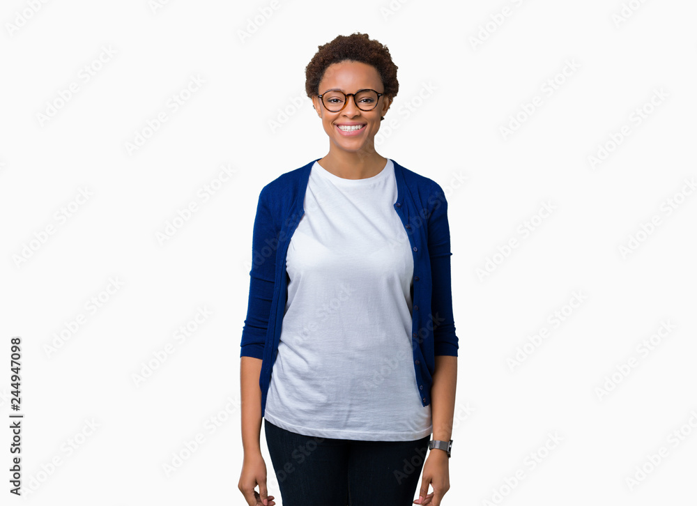 Young beautiful african american woman wearing glasses over isolated background with a happy and cool smile on face. Lucky person.