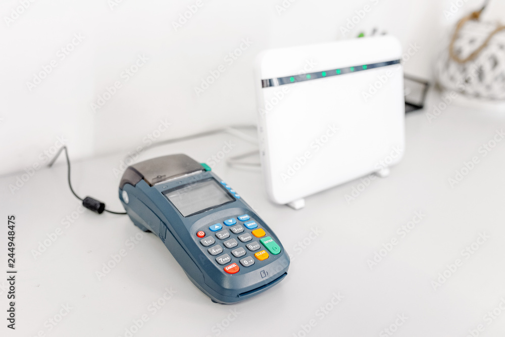 Pos terminal and wireless network router in office Pos terminal and wireless network router in office