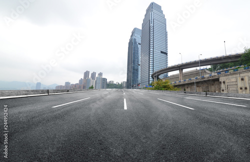 The expressway and the modern city skyline are in Chongqing  China.