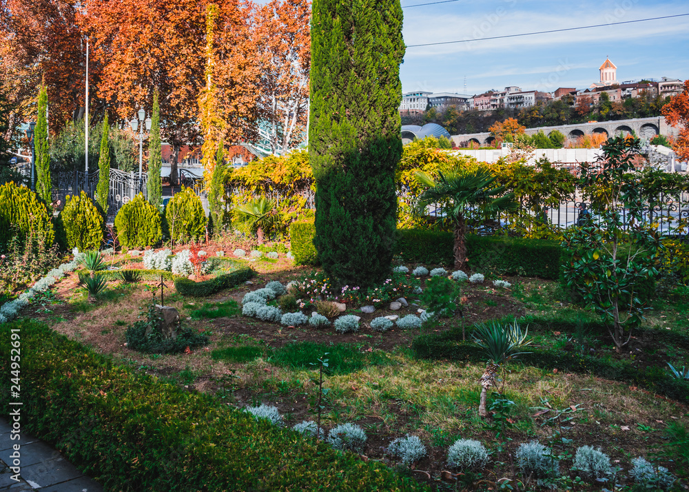 Beautiful well maintained garden in the city center on a sunny day Beautiful well maintained garden in the city center on a sunny day