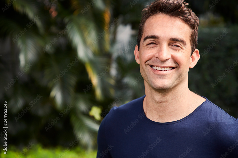 Good looking guy smiling to camera Good looking guy smiling to camera