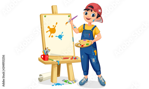 Artist boy painting on canvas