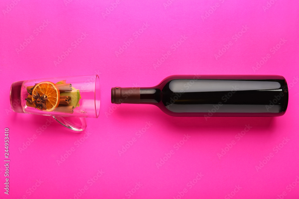 Composition with ingredients for tasty mulled wine on color background Composition with ingredients for tasty mulled wine on color background