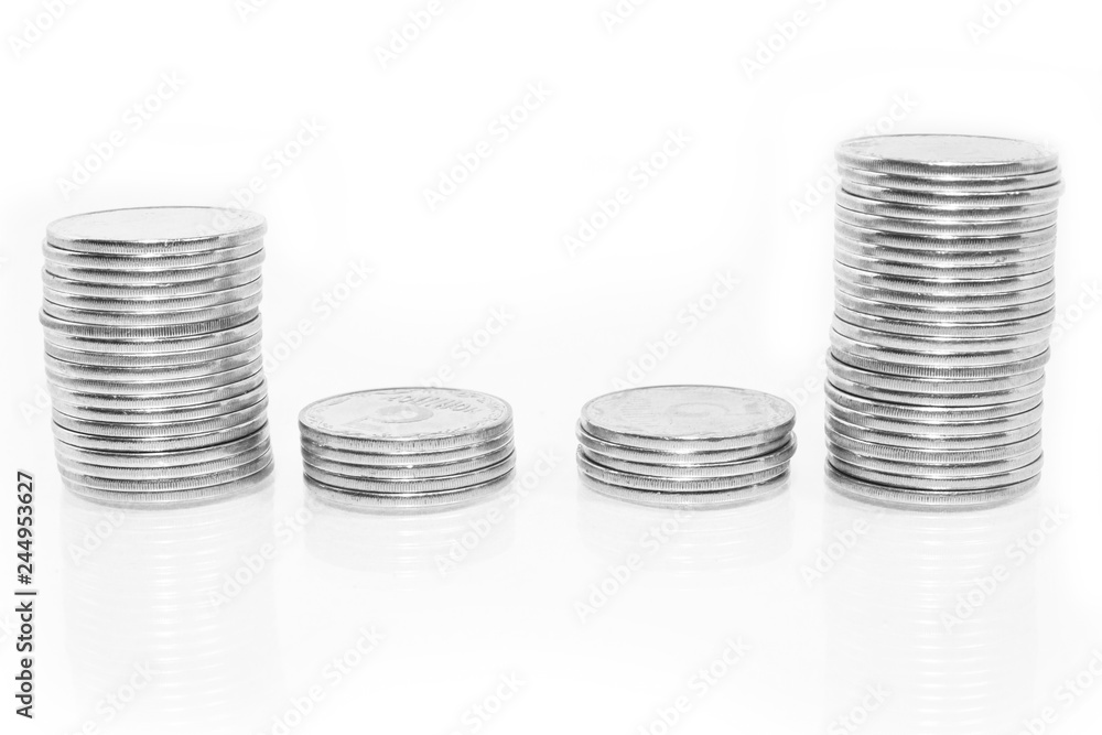 Business money graph coins on white background Business money graph coins on white background