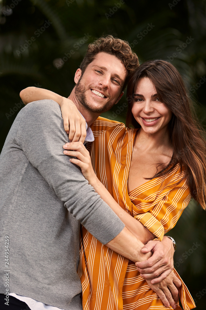 Happy smiling couple looking at camera Happy smiling couple looking at camera