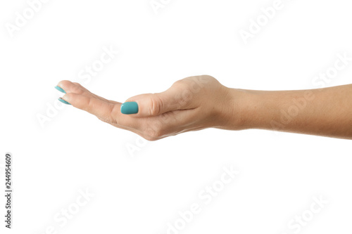 Female hand with beautiful manicure holding something on white background