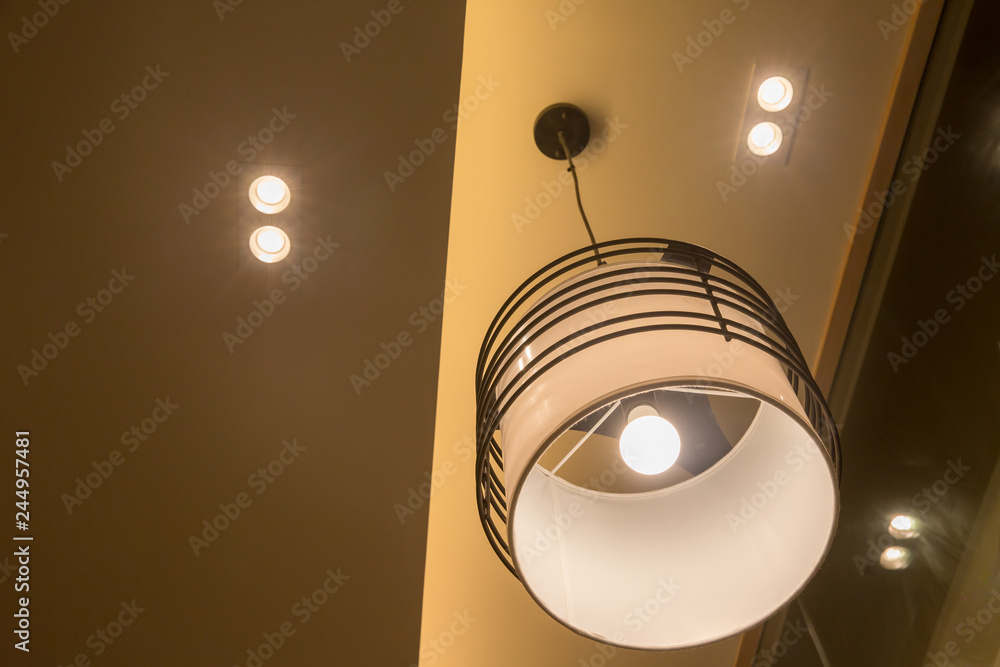 Ceiling lamp.Interior Lighting. symmetry. A group of hanging lights with shallow depth of field.Beautiful chandelier isolated Ceiling lamp.Interior Lighting. symmetry. A group of hanging lights with shallow depth of field.Beautiful chandelier isolated