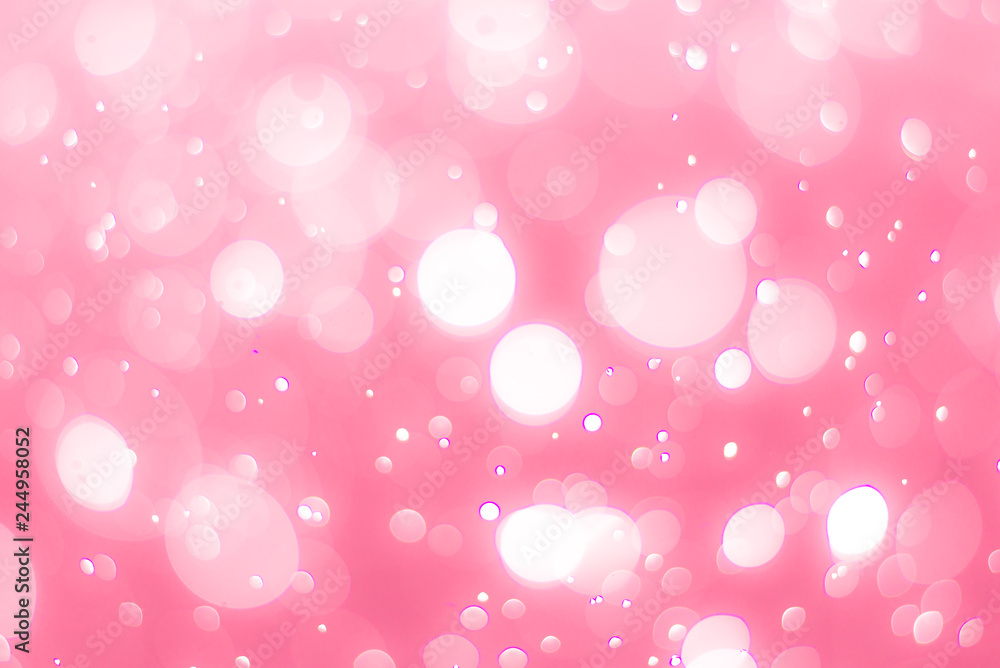 abstract bokeh light effect with soft pink background