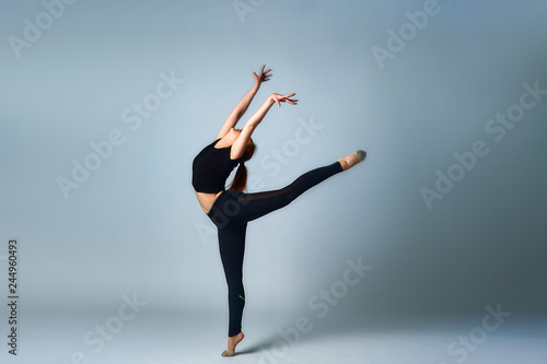 Wallpaper Mural Fitness woman doing dancing exercise. white background Torontodigital.ca