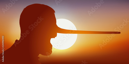 Concept de la désinformation et du mensonge avec comme symbole, un homme qui ment et voit son nez s’allonger photo
