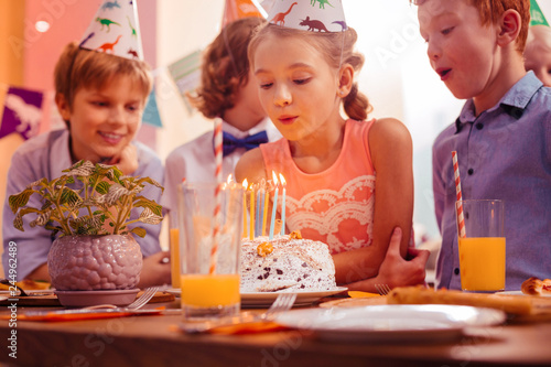 Positive delighted children being on birthday party
