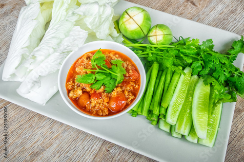 Northern Thai Meat and Tomato Spicy Dip (Nam prik ong) is food in the North of Thailand. photo