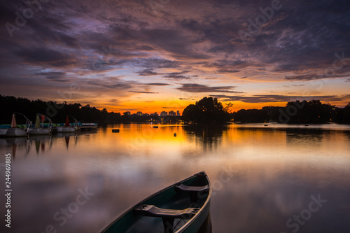 Canoe on the lake during sunset