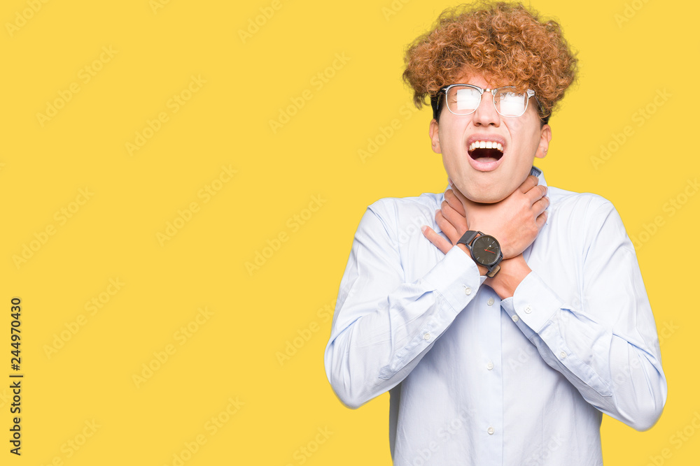 Young handsome business man with afro wearing glasses shouting and suffocate because painful strangle. Health problem. Asphyxiate and suicide concept. Young handsome business man with afro wearing glasses shouting and suffocate because painful strangle. Health problem. Asphyxiate and suicide concept.