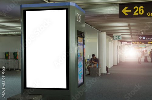 mock up of vertical blank advertising billboard or light box showcase with people waiting at airport, copy space for your text message or media content, advertisement, commercial and marketing concept
