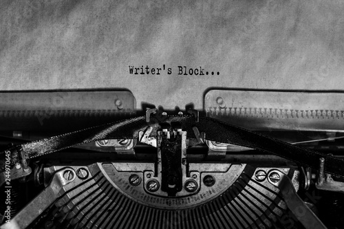 Writer's Block on a sheet of paper printed on a vintage typewriter. writer, journalist.