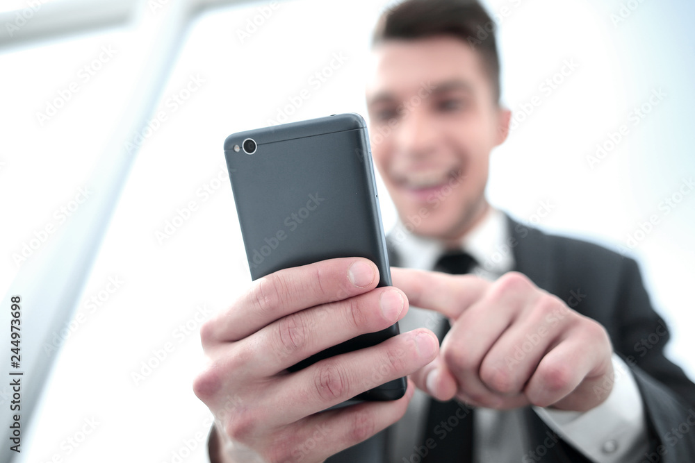businessman reading a text message businessman reading a text message
