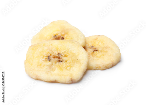 Sweet banana slices on white background. Dried fruit as healthy snack © New Africa