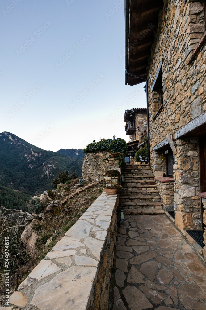 Mountain view on an outdoor terrace on a rural hotel in Pyrenees Mountain view on an outdoor terrace on a rural hotel in Pyrenees