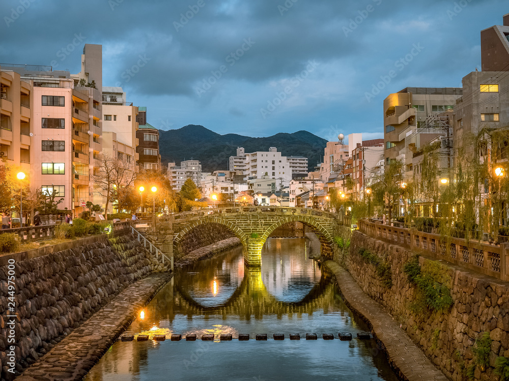 Naklejka premium Megane bashi Bridge at night in Nagasaki City, Japan.