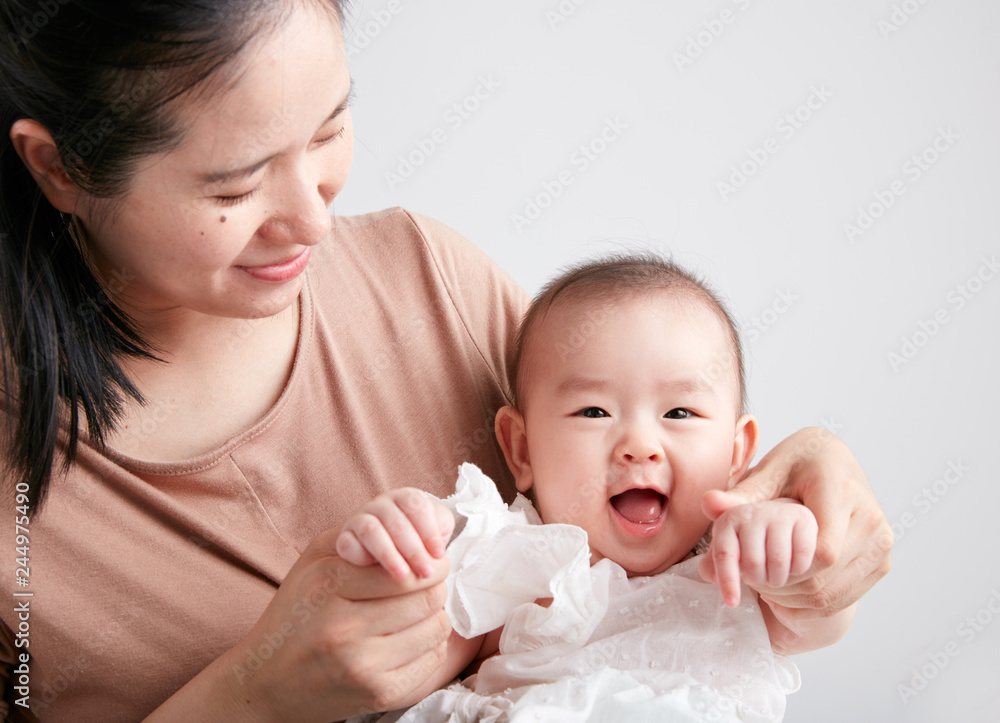 portrait of asian mother and baby lifestyle image
portrait of asian mother and baby lifestyle image