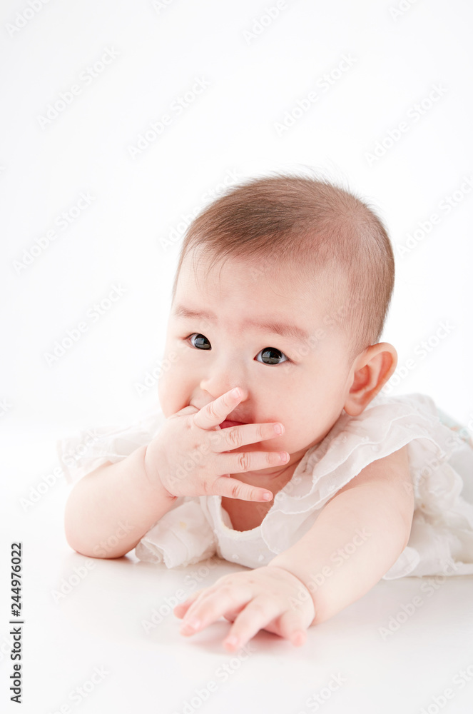 Asian cute baby, shot in studio white background Asian cute baby, shot in studio white background