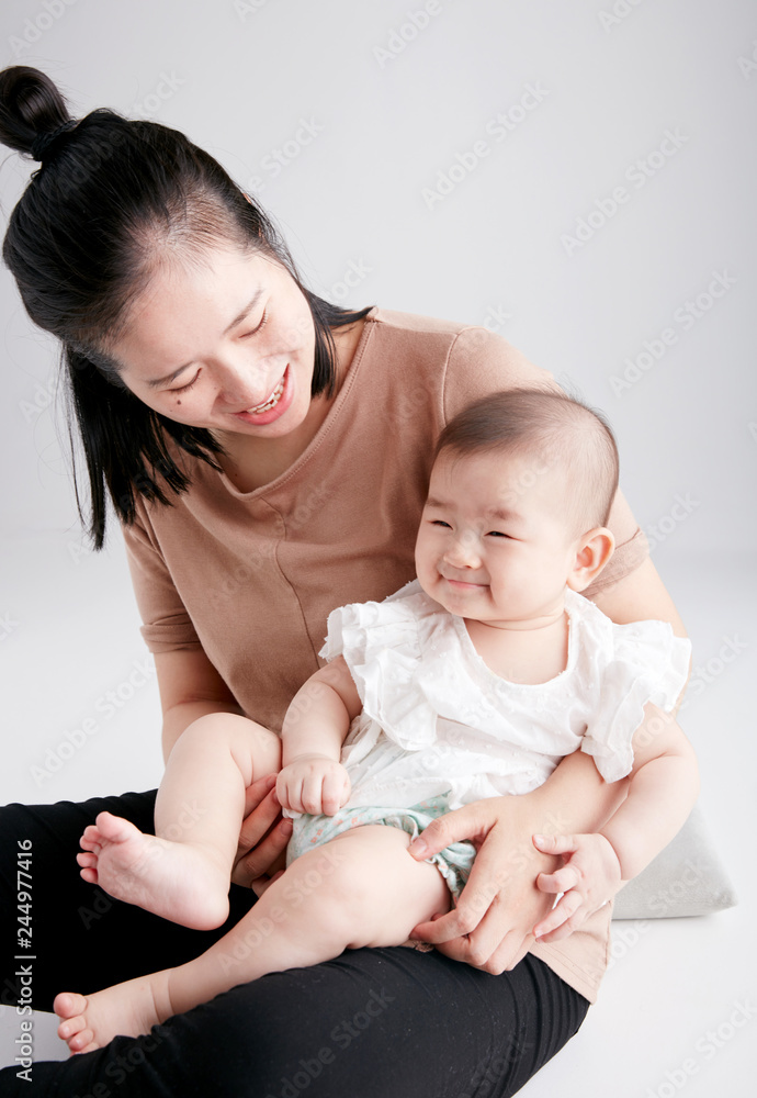 portrait of asian mother and baby lifestyle image
portrait of asian mother and baby lifestyle image