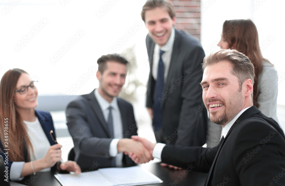 Business people doing handshake after agreement Business people doing handshake after agreement