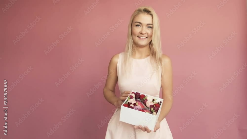 Woman florist holding a bouquet of beautiful flowers