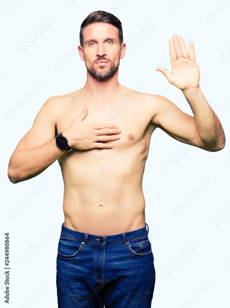 Handsome shirtless man showing nude chest Swearing with hand on chest and open palm, making a loyalty promise oath Handsome shirtless man showing nude chest Swearing with hand on chest and open palm, making a loyalty promise oath