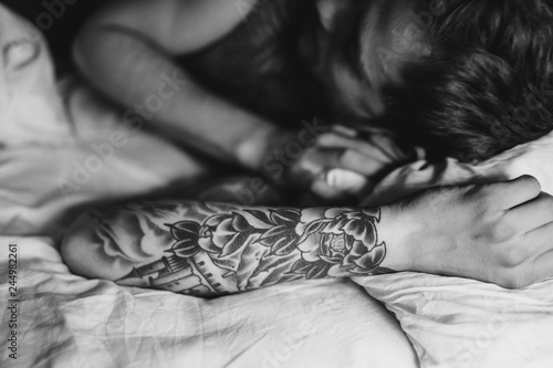 a man in bed wakes up