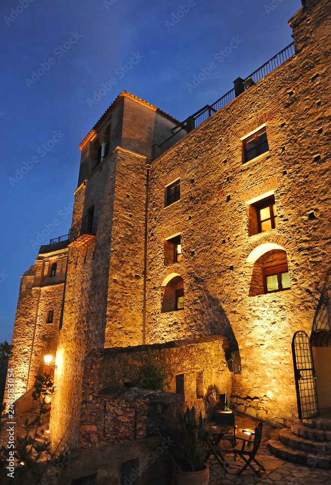 Medieval castle of Castellar de la Frontera (Old Castellar) illuminated at night, villages of Cadiz, Spain
