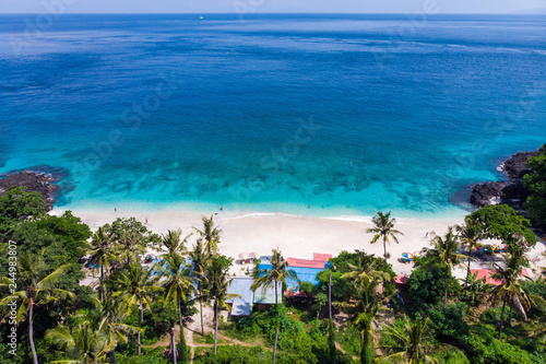 Bali seascape with huge waves at beautiful hidden white sand beach. Bali sea beach nature, outdoor Indonesia. Bali island landscape. Summer holidays at ocean beach. Travel vacation in Indonesia beach.