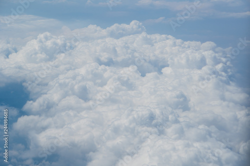 Fototapeta Naklejka Na Ścianę i Meble -  Skyline View above the Clouds from air plane