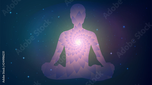 Silhouette of human sitting in the lotus position on cosmos background. Meditation, yoga, trans