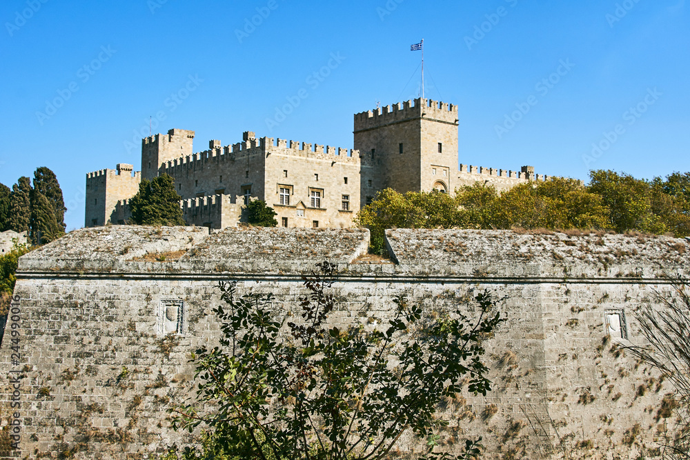 The walls and turrets of the medieval castle of the Joannite Order in the city of Rhodes..