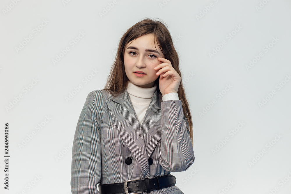 A beautiful girl on a white background is isolated A beautiful girl on a white background is isolated
