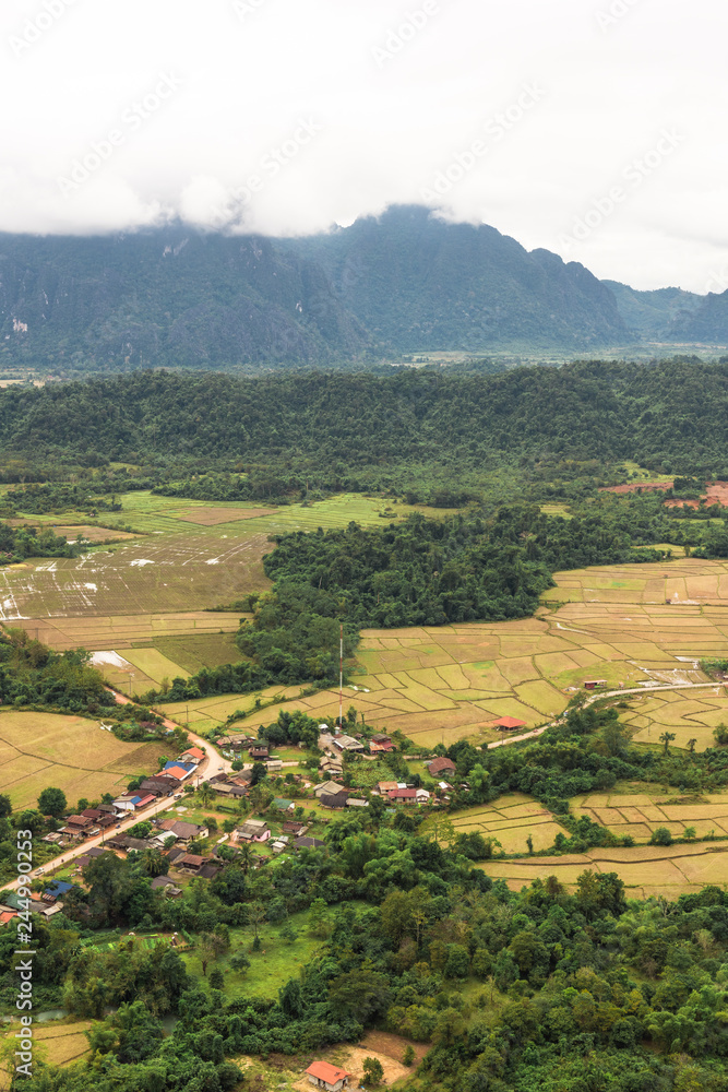 Countryside surrounded by rice fields and mountain