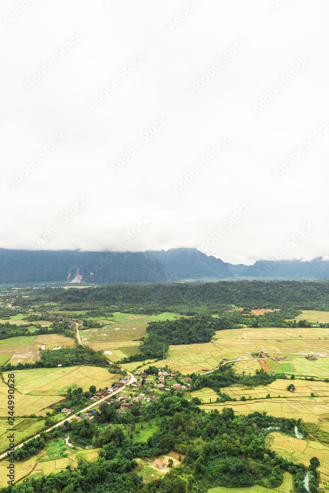 Countryside surrounded by rice fields and mountain