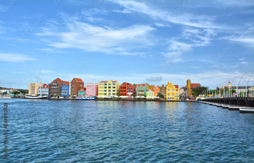 Waterfront with harbour and colorful houses in Curacao.