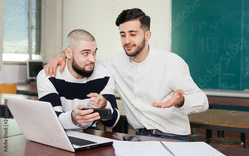 University students using mobile phone